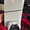 Digital PlayStation five with charging station and two controllers